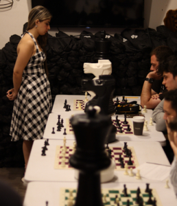 Chess NYC instructor leading a private lesson at a special event