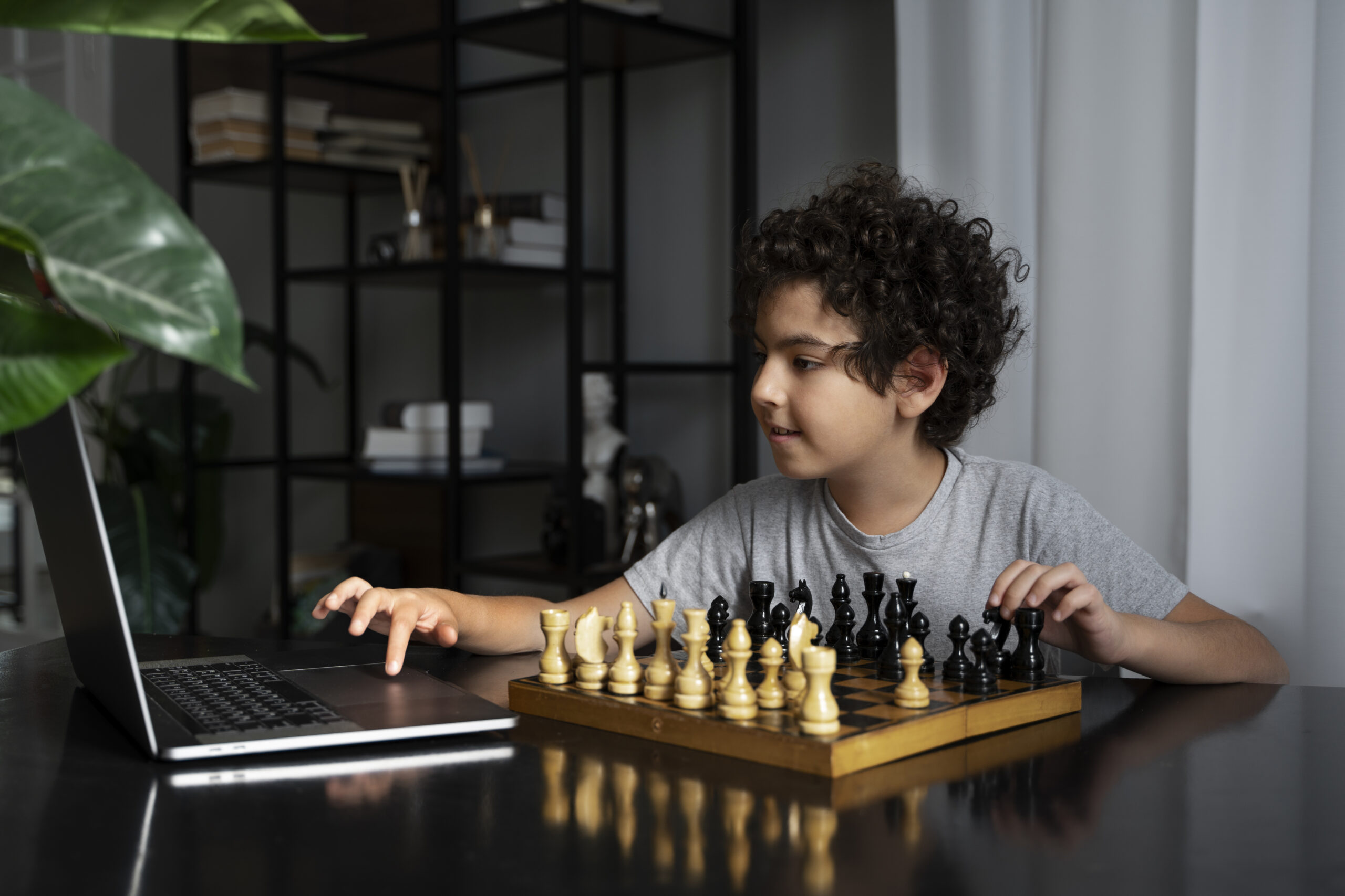Student studying chess online